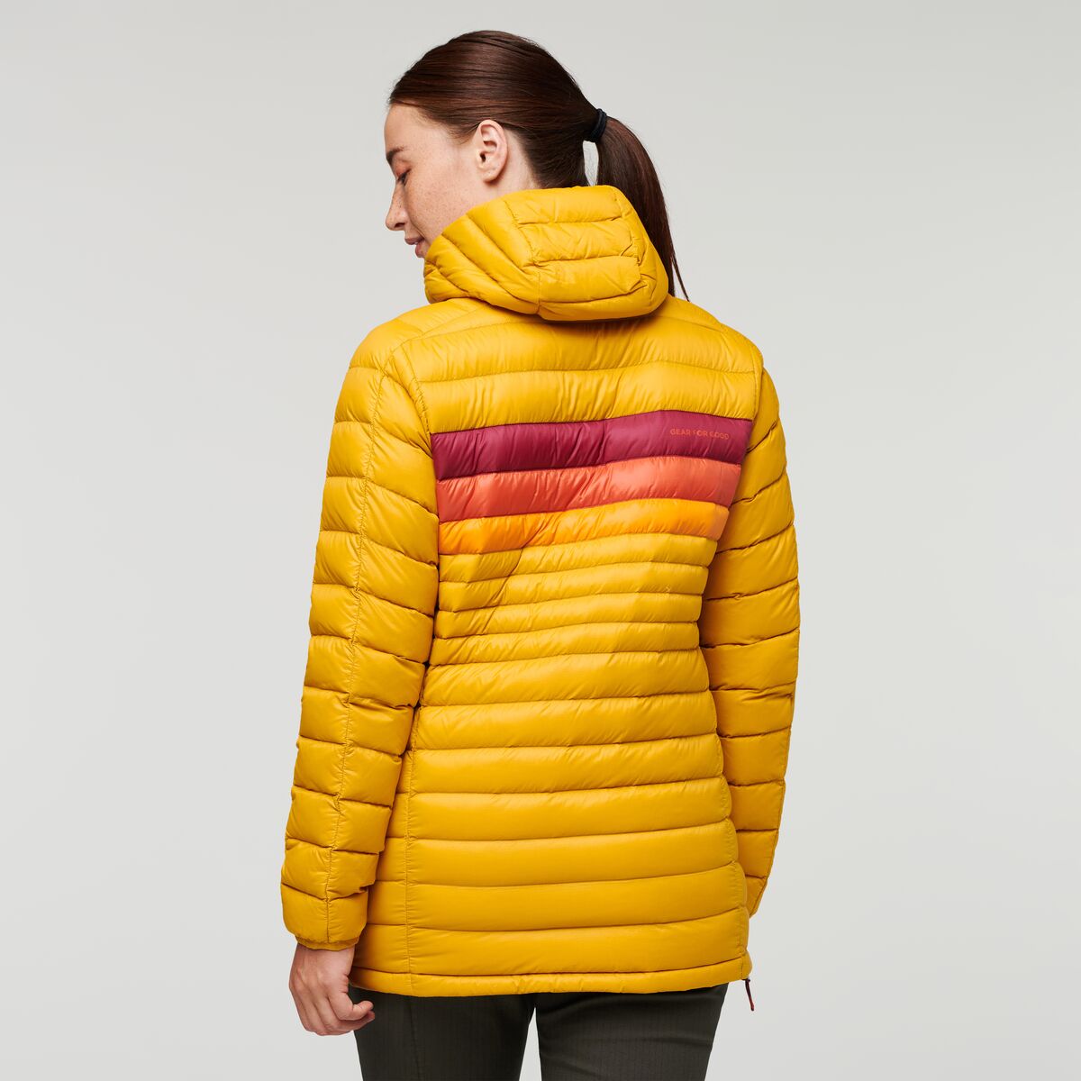 Fuego Down Hooded Pullover - Women's, Amber Stripes, Model Aya
