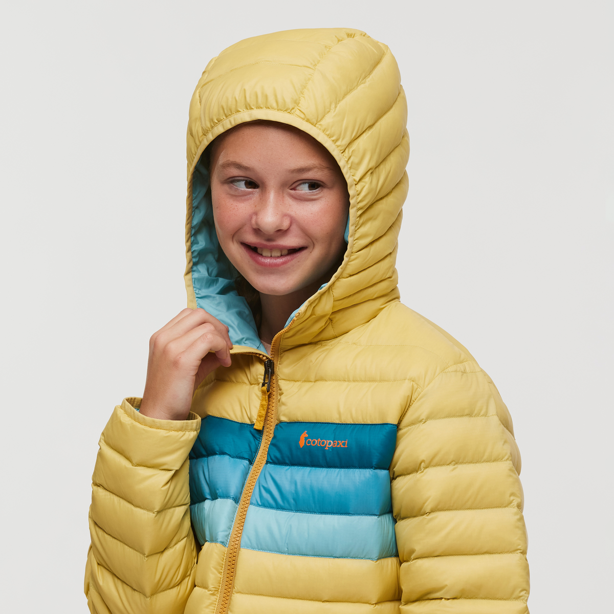 Fuego Hooded Down Jacket - Kids', Wheat Stripes, Model Gemma Nye