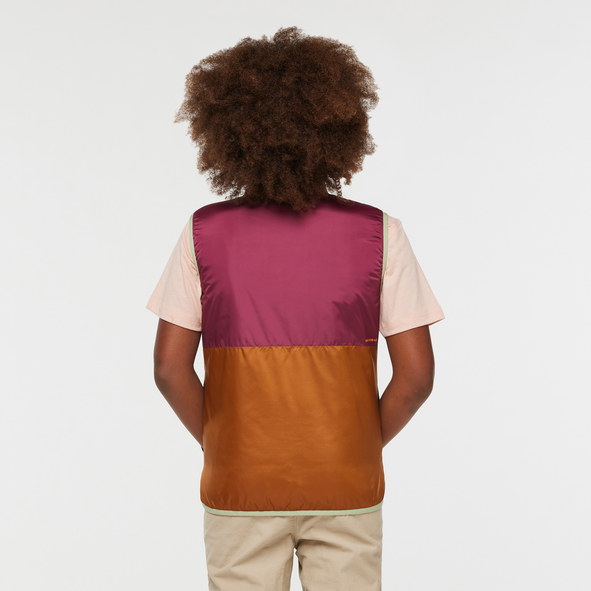 Teca Cálido Vest - Kids', Camelia, Model Isaiah