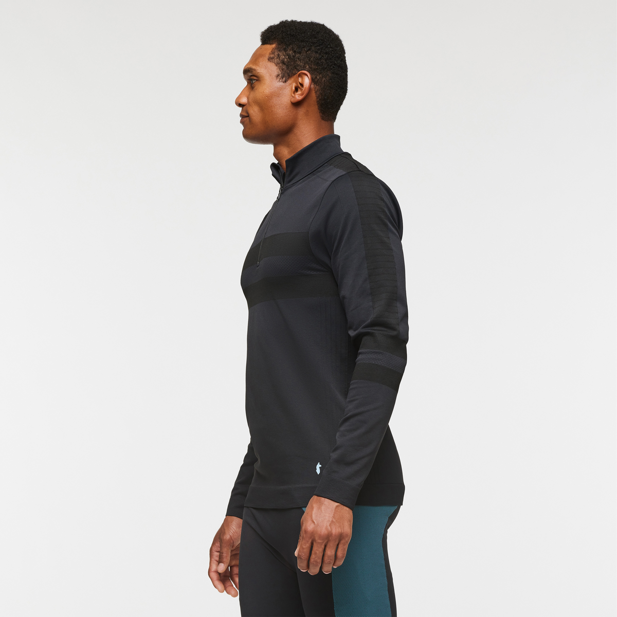 Debajo Seamless Baselayer Quarter-Zip - Men's, Cotopaxi Black, Model Jason