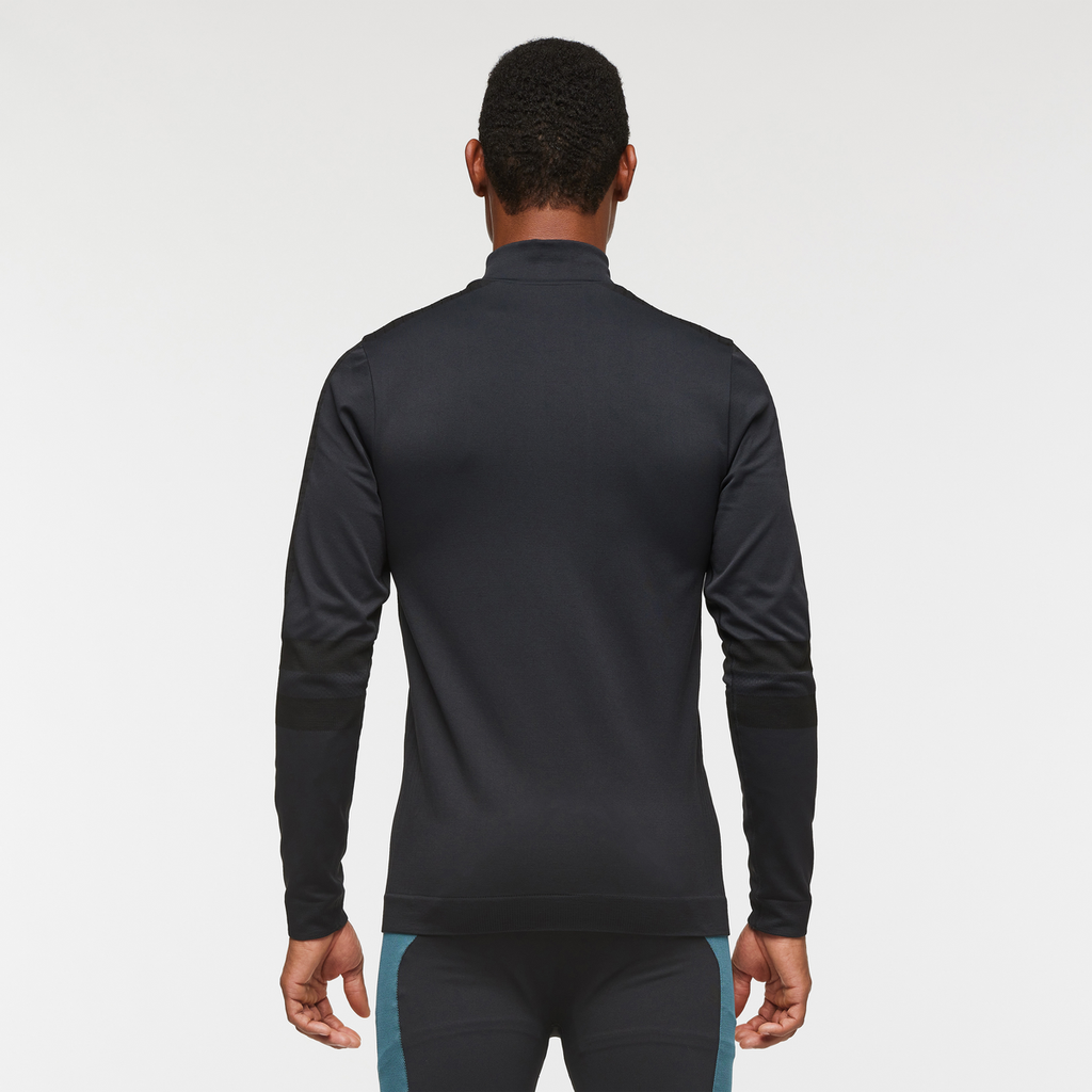 Debajo Seamless Baselayer Quarter-Zip - Men's, Cotopaxi Black, Model Jason