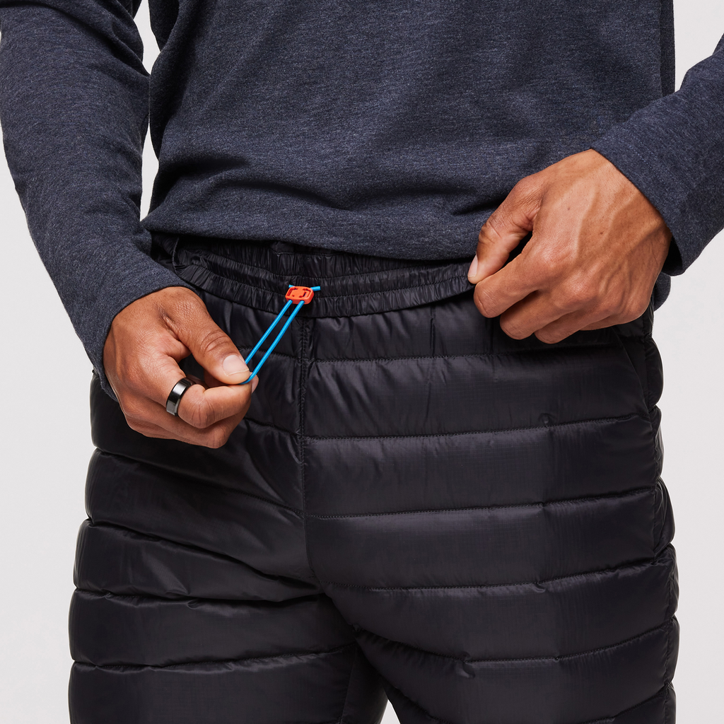 Fuego Down Pant - Men's, Black Stripes, Model Jason