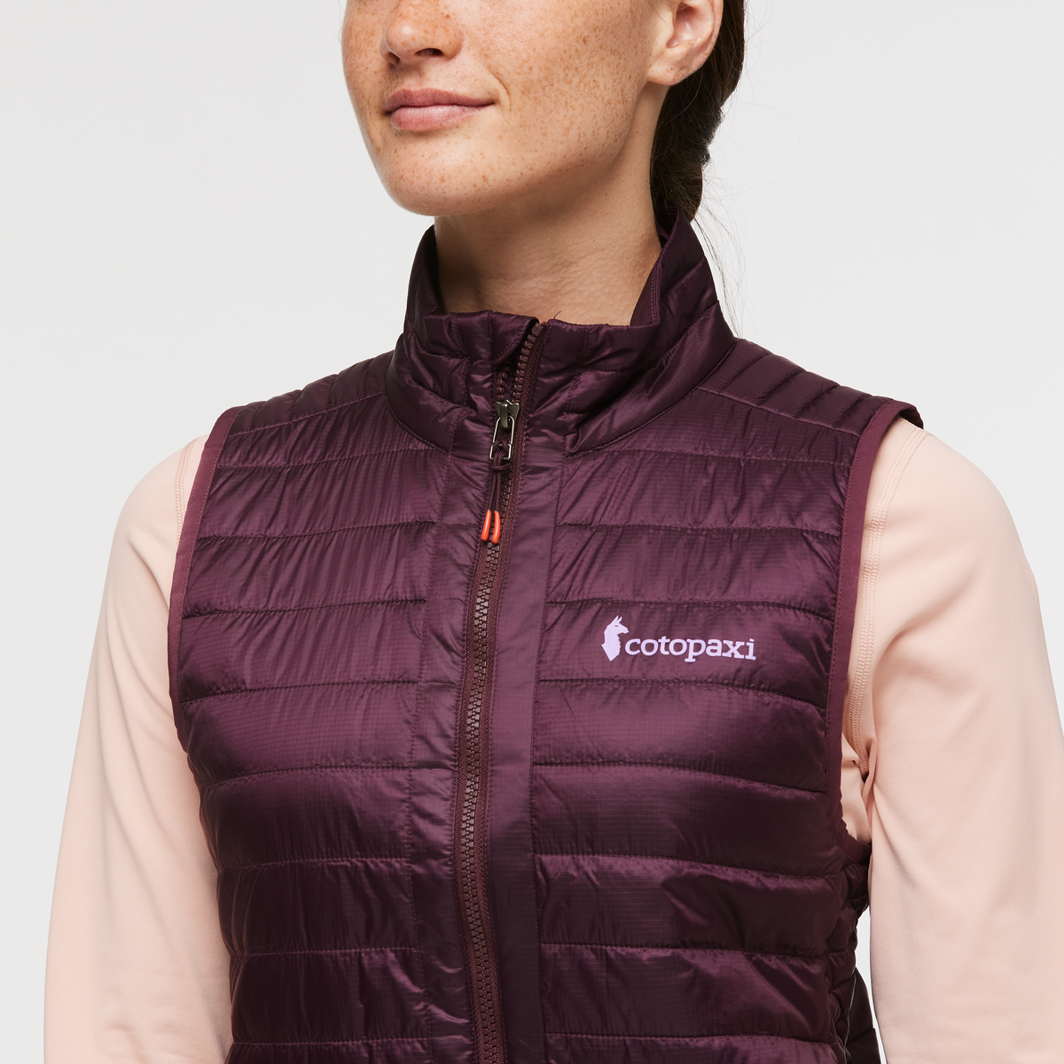 Capa Insulated Vest - Women's, Cotopaxi Wine, Model Aya