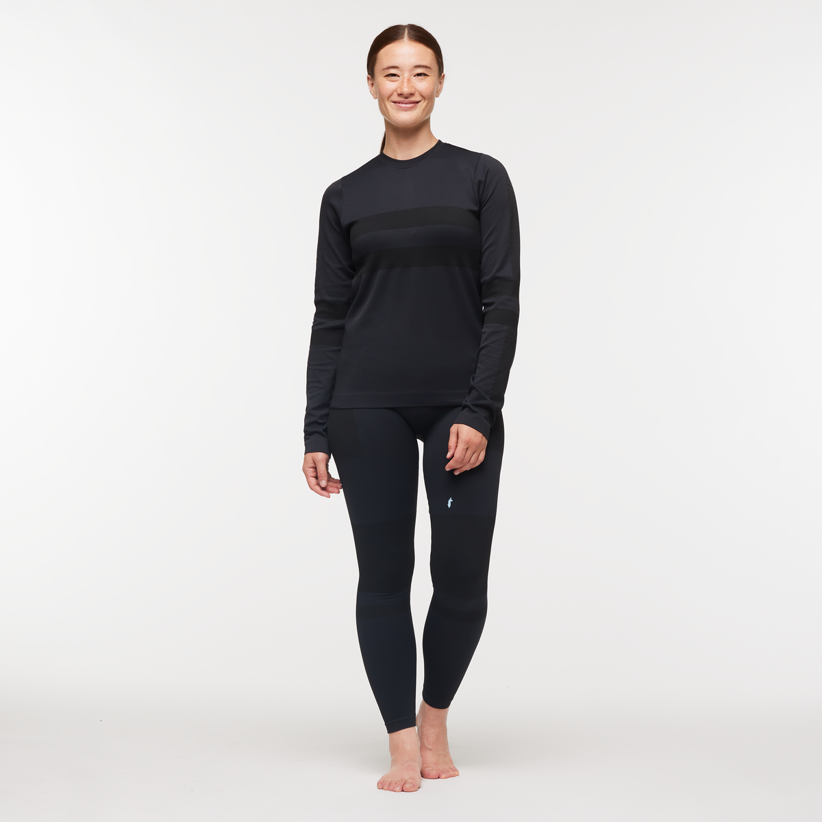 Debajo Seamless Baselayer Crew - Women's, Cotopaxi Black, Model Aya