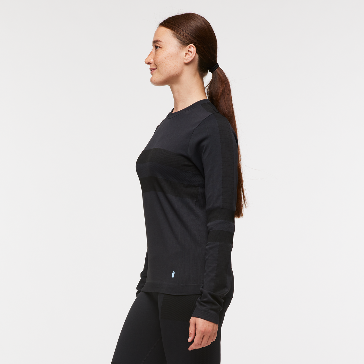 Debajo Seamless Baselayer Crew - Women's, Cotopaxi Black, Model Aya