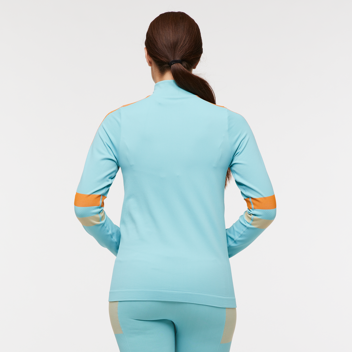 Debajo Seamless Baselayer Quarter-Zip - Women's, Bluebird Stripes, Model Aya