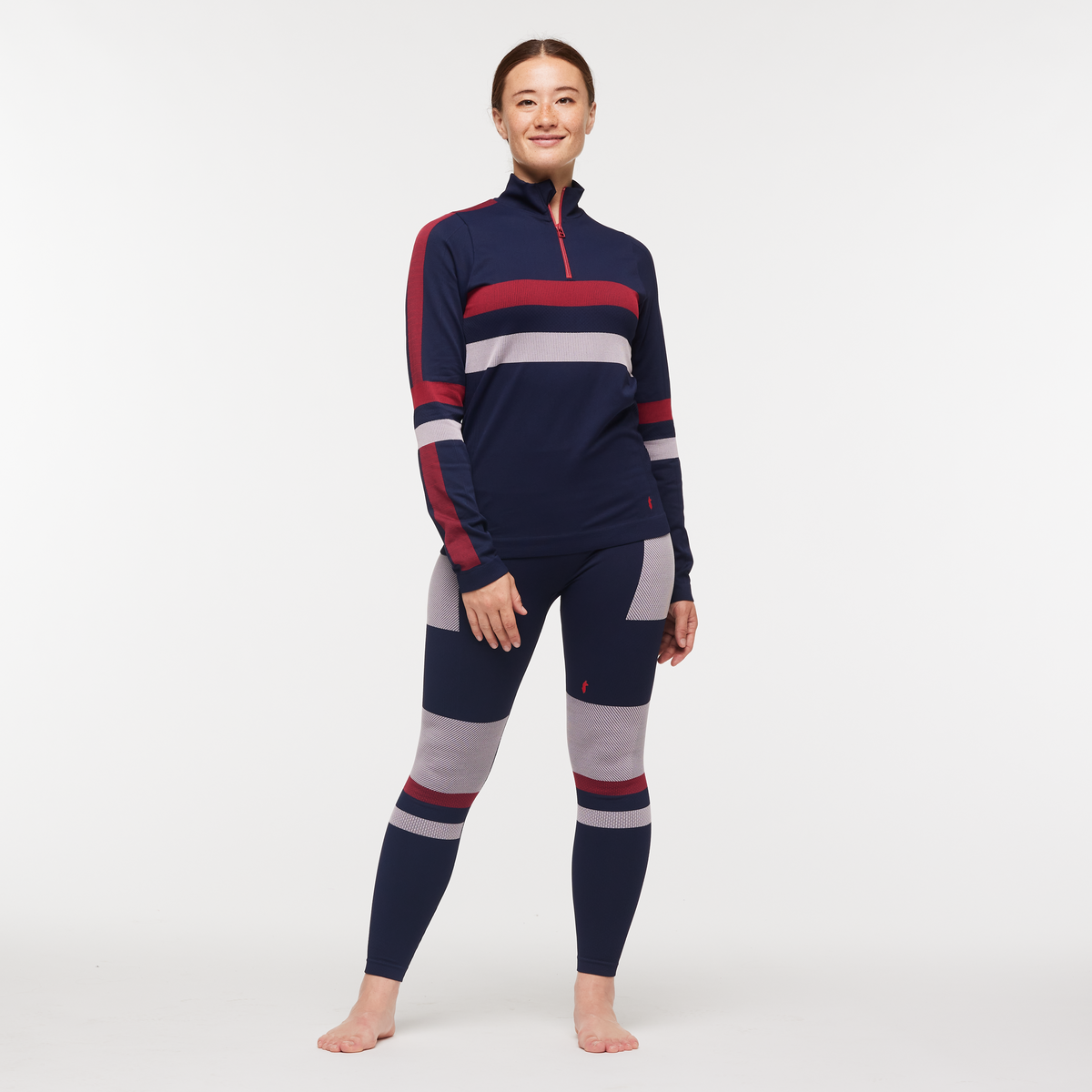 Debajo Seamless Baselayer Quarter-Zip - Women's, Ink Stripes, Model Aya