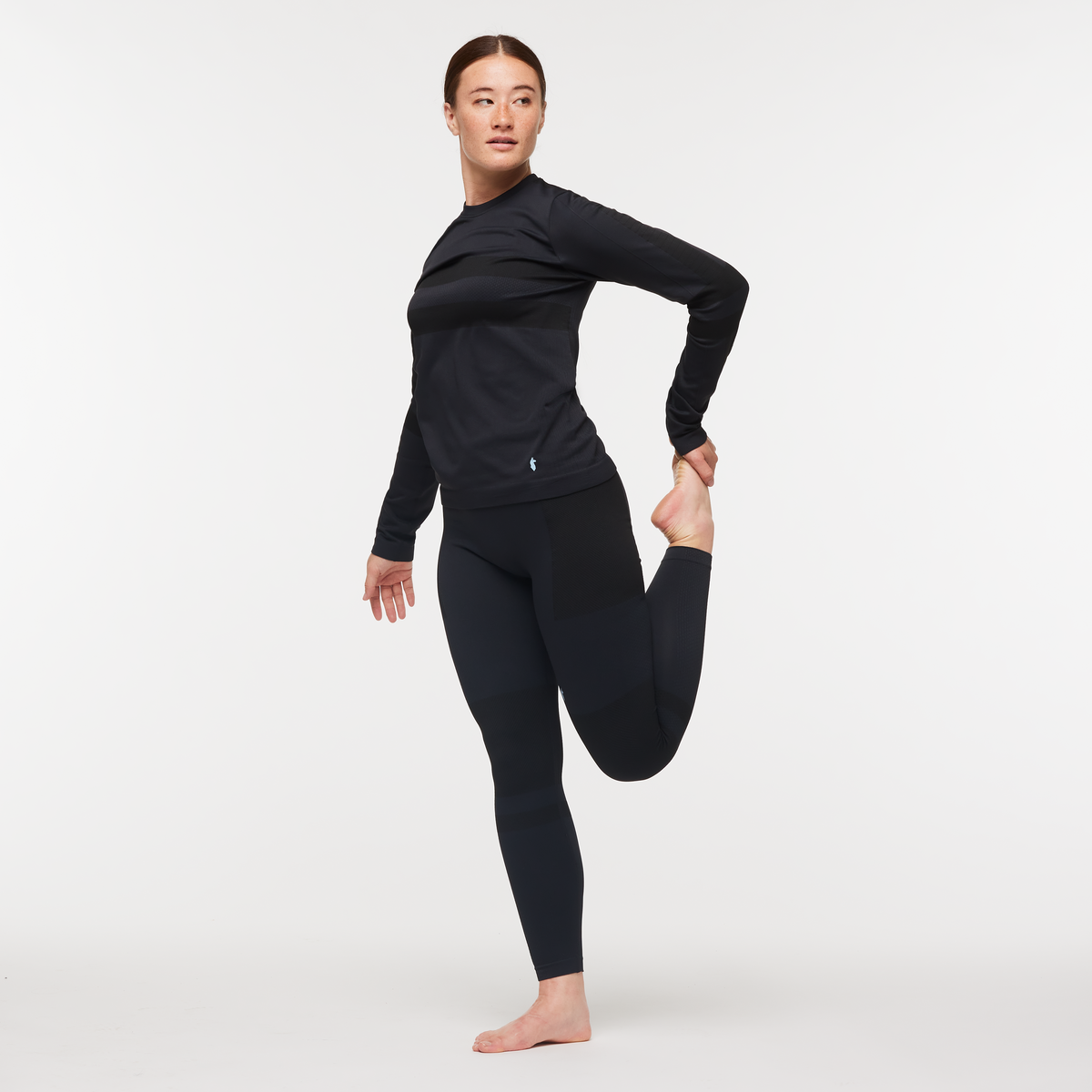 Debajo Seamless Baselayer Tight - Women's, Cotopaxi Black, Model Aya