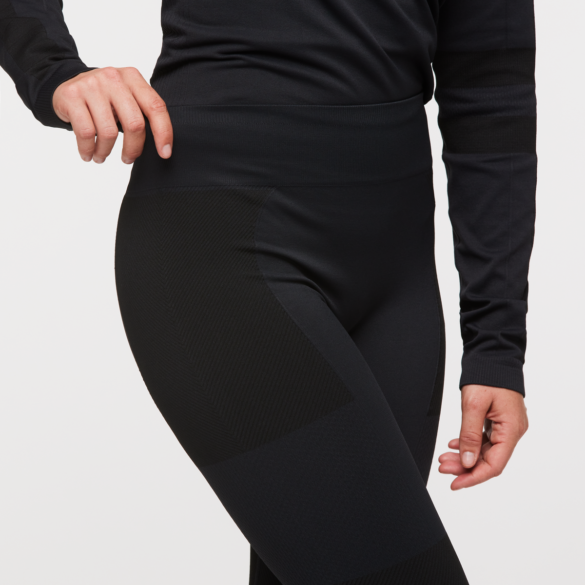 Debajo Seamless Baselayer Tight - Women's, Cotopaxi Black, Model Aya