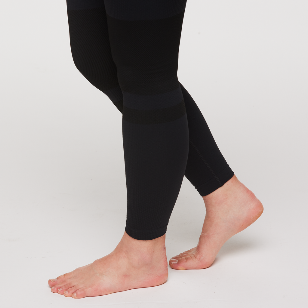 Debajo Seamless Baselayer Tight - Women's, Cotopaxi Black, Model Aya