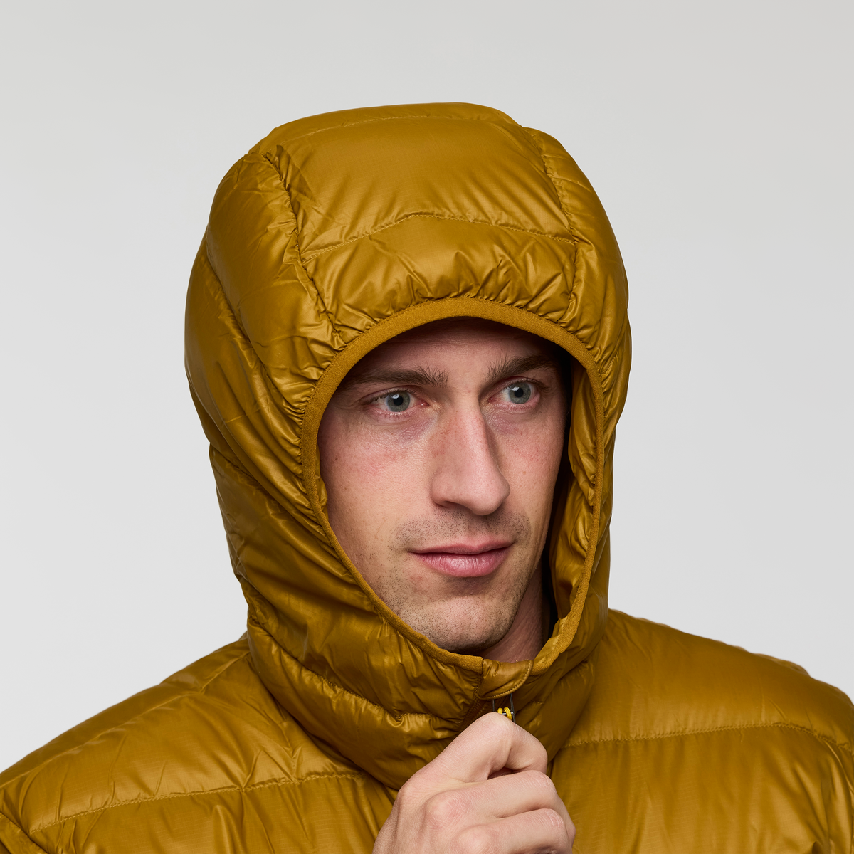 Fuego Max Down Hooded Jacket - Men's, Bronze/Deep Sea, Model Jackson