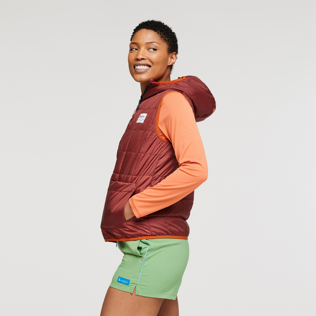 Teca Cálido Hooded Vest - Women's, Spicy Sweet, Model Callie