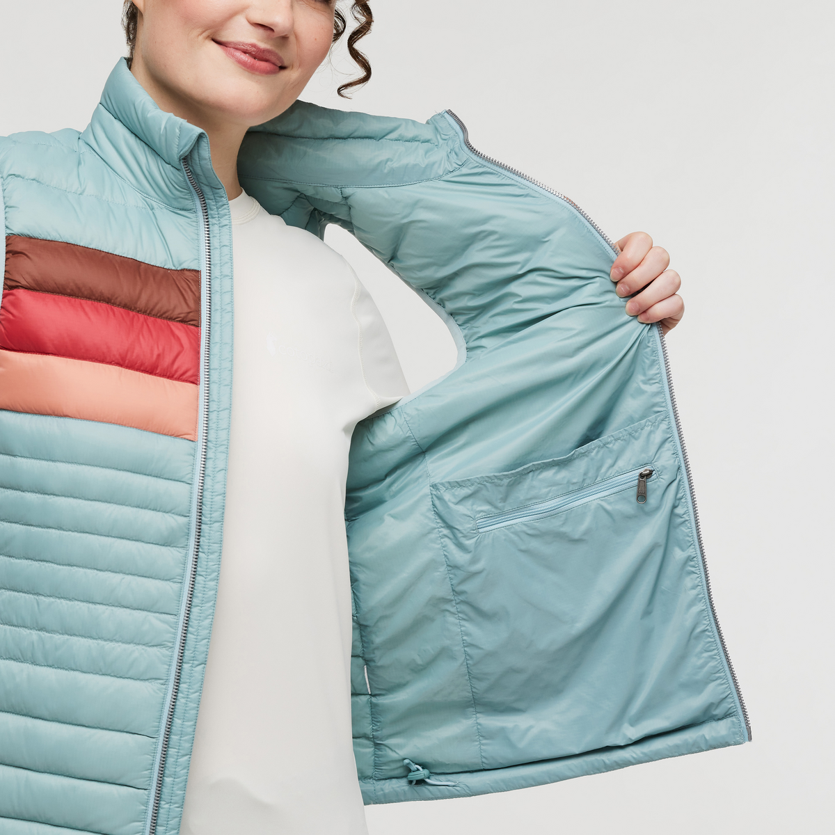 Fuego Down Vest - Women's, Sea Spray Stripes, Model Courtney