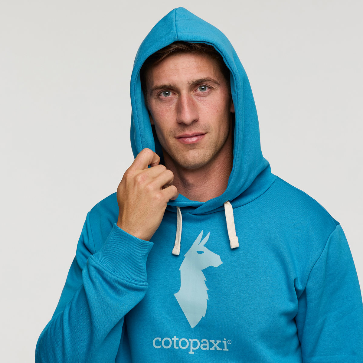 Cotopaxi Llama Pullover Hoodie - Men's, Lake, Model Jackson
