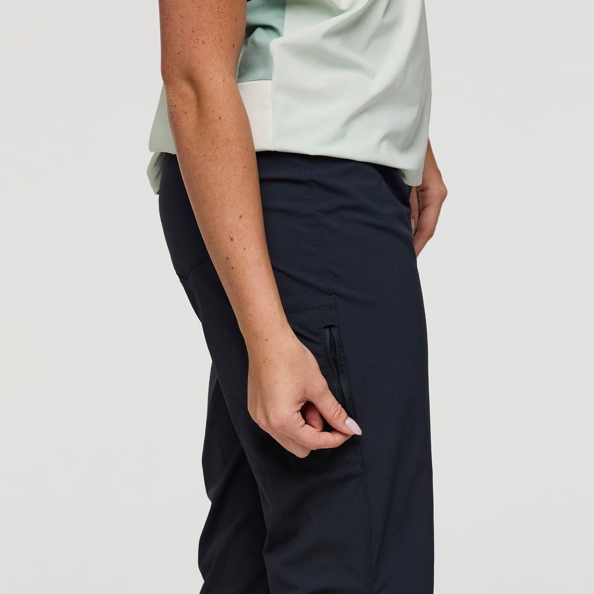 Coraje Tech Pant - Women's, Carbon, Model Caitlyn