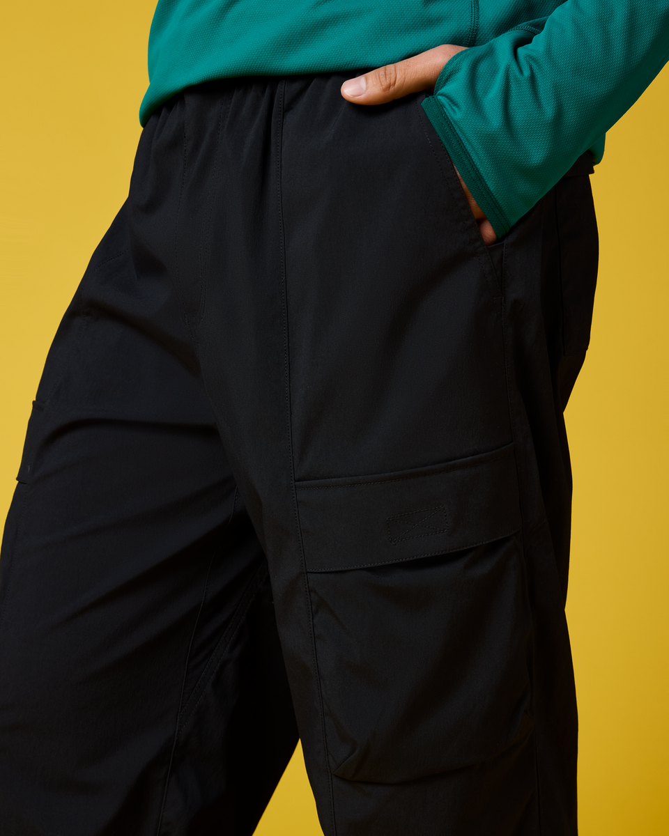 Coraje Tech Cargo Pant - Men's, Black, Model Christian
