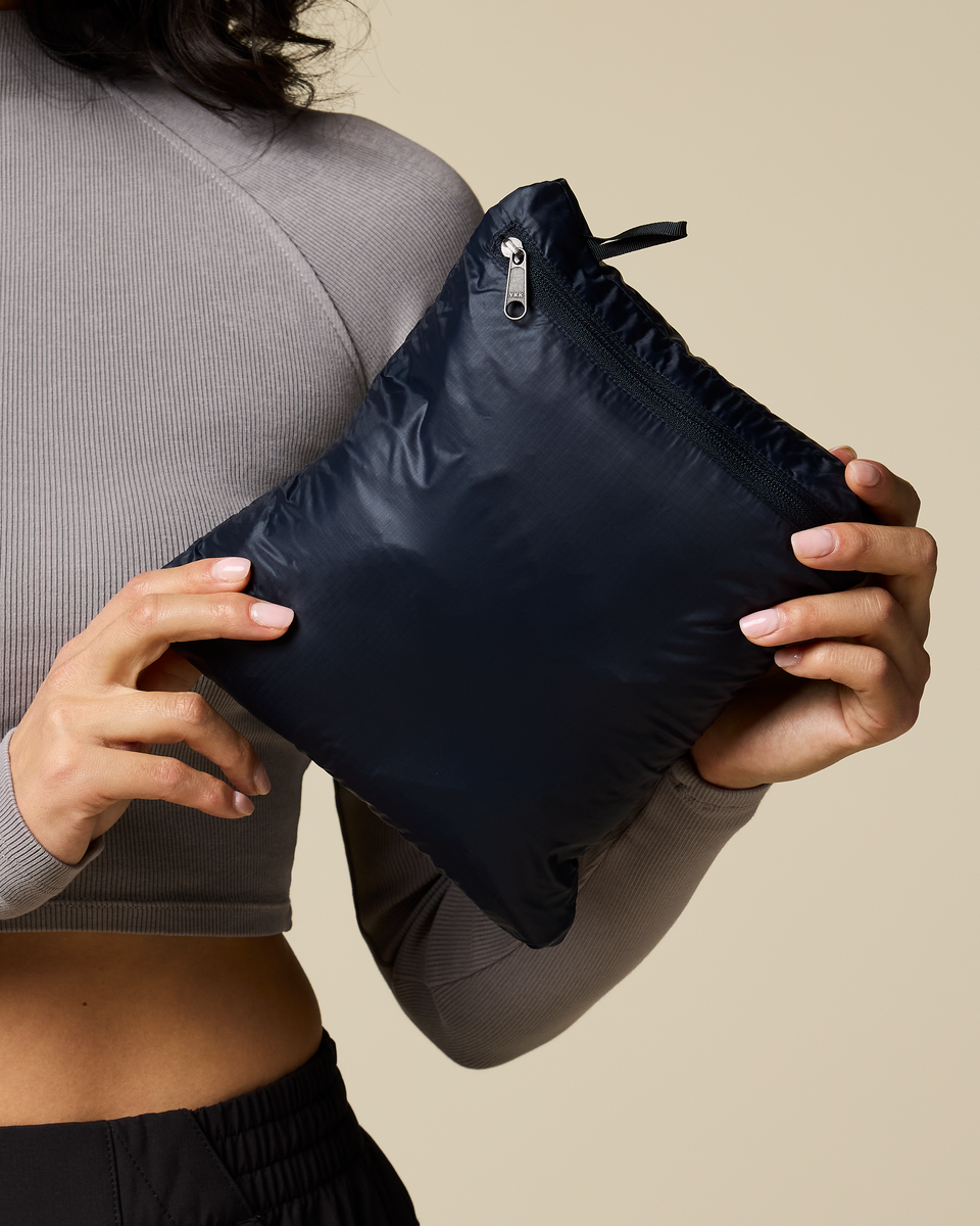 Fuego Down Vest - Women's, Carbon Stripes, Model Tiff